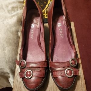 Burgundy leather pumps